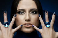 Image of a woman with diamond rings